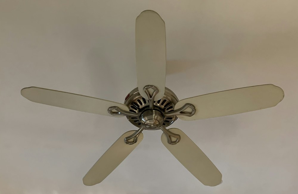 White five-blade ceiling fan